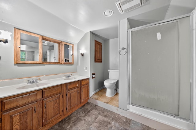 1973 State Route 17k, Montgomery, NY 12549 - bathroom with a shower stall, double vanity, and lofted ceiling