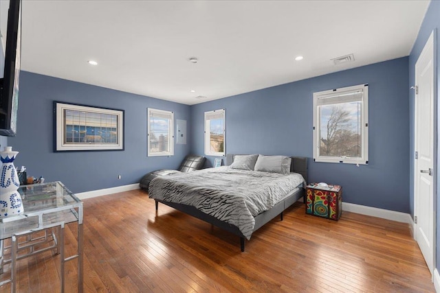 1136 W Broadway, Hewlett, NY 11557 - bedroom with multiple windows, wood-type flooring, and recessed lighting