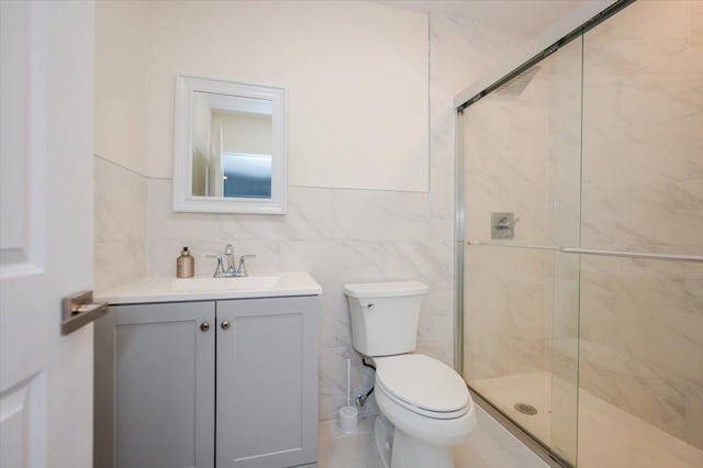 1136 W Broadway, Hewlett, NY 11557 - full bath with a stall shower, vanity, and tile walls