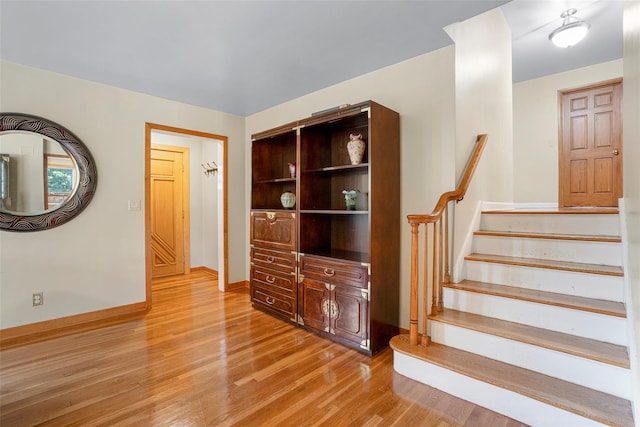 918 Sylvan Ln, Mamaroneck, NY 10543 - stairway with wood finished floors and baseboards