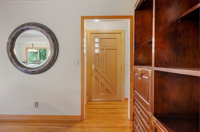 918 Sylvan Ln, Mamaroneck, NY 10543 - hallway with baseboards and wood finished floors
