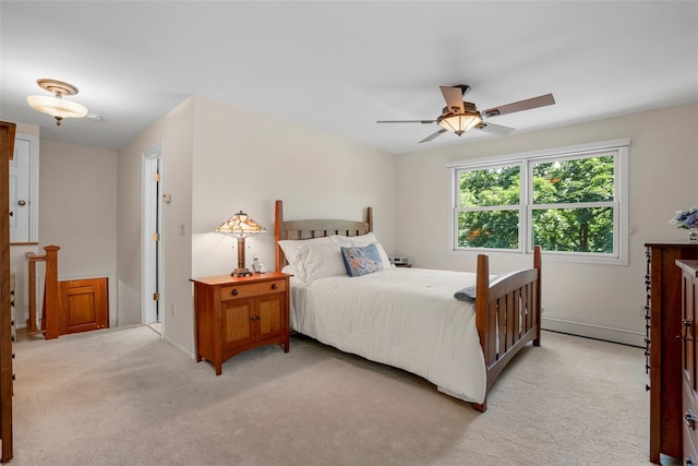 918 Sylvan Ln, Mamaroneck, NY 10543 - bedroom featuring light carpet, a baseboard radiator, and ceiling fan