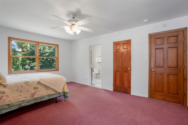 918 Sylvan Ln, Mamaroneck, NY 10543 - carpeted bedroom with a ceiling fan and ensuite bathroom