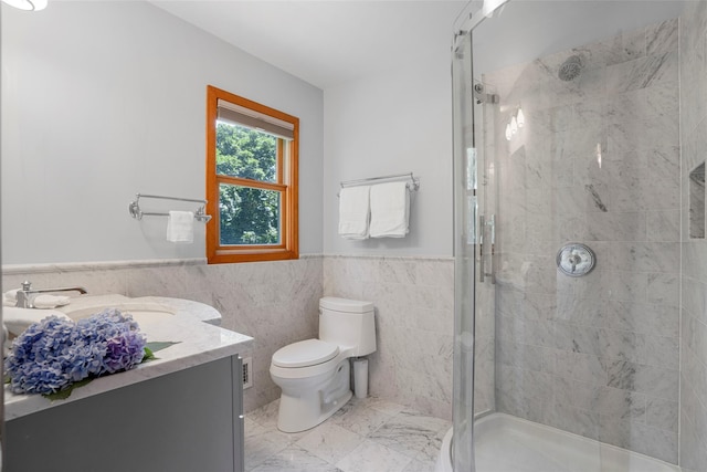 918 Sylvan Ln, Mamaroneck, NY 10543 - full bathroom featuring a shower stall, vanity, tile walls, and wainscoting