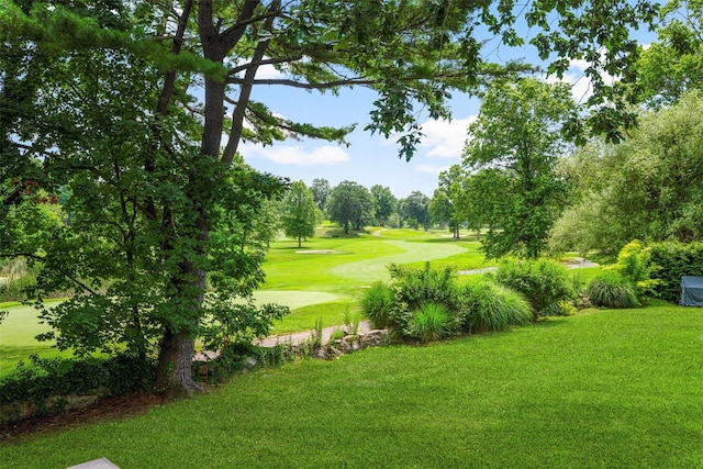 918 Sylvan Ln, Mamaroneck, NY 10543 - view of home's community with golf course view, a lawn, and view of wooded area