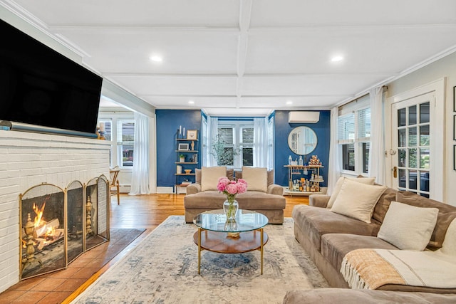 271 Foster Ave, Sayville, NY 11782 - living room featuring a wall mounted AC, plenty of natural light, coffered ceiling, recessed lighting, and a fireplace