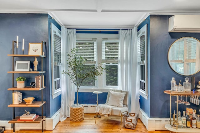 271 Foster Ave, Sayville, NY 11782 - sitting room with a wall mounted AC, wood finished floors, and ornamental molding