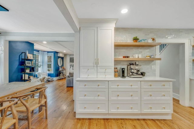 271 Foster Ave, Sayville, NY 11782 - bar featuring light wood-style flooring, decorative backsplash, and recessed lighting