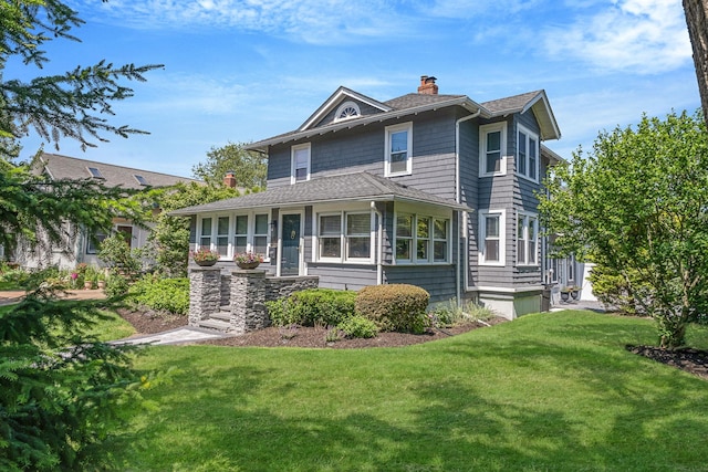 271 Foster Ave, Sayville, NY 11782 - traditional style home with a chimney and a front yard