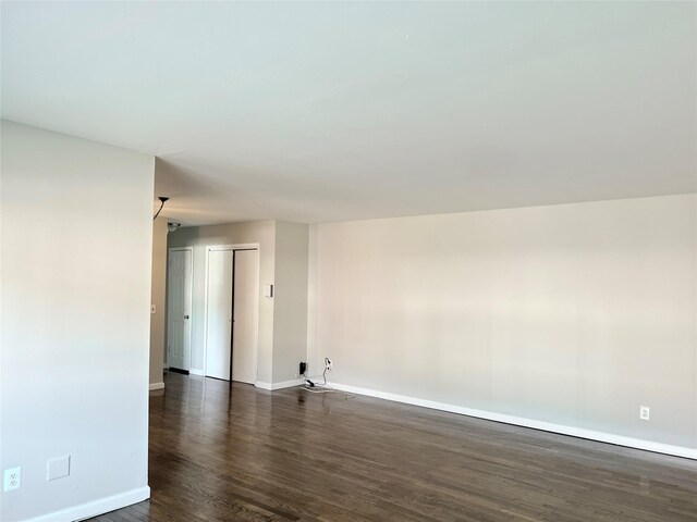 2453 Union Blvd Unit 3A, Islip, NY 11751 - spare room with baseboards and dark wood finished floors