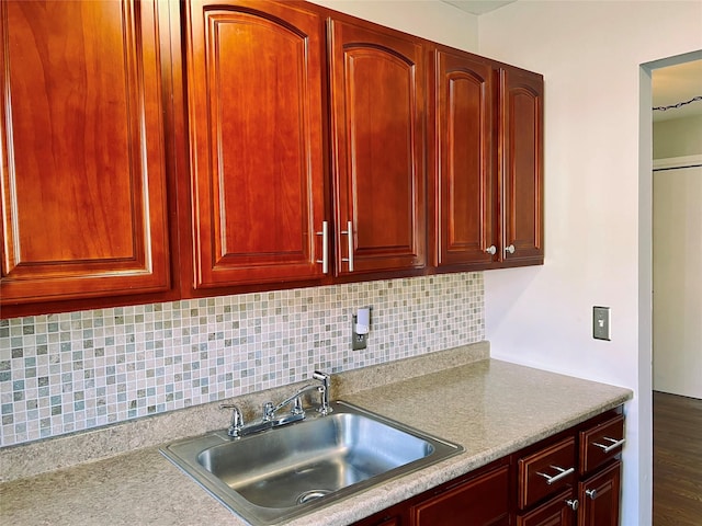 2453 Union Blvd Unit 3A, Islip, NY 11751 - kitchen with dark brown cabinets, decorative backsplash, and light countertops