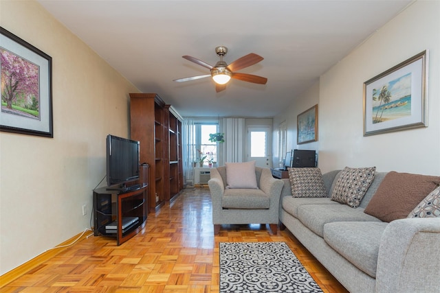 65-15 Alderton St Unit 2C, Rego Park, NY 11374 - living area featuring ceiling fan and baseboards