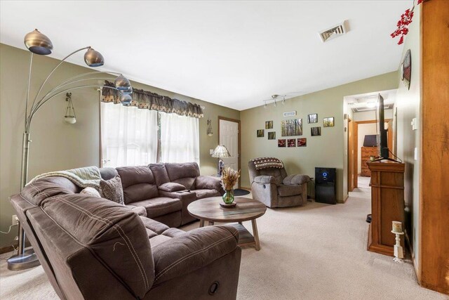 61 Travis Blvd, Catskill, NY 12414 - living room featuring light carpet