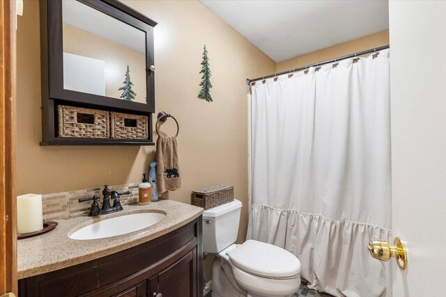 61 Travis Blvd, Catskill, NY 12414 - full bathroom with vanity and decorative backsplash