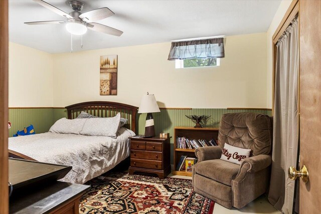 61 Travis Blvd, Catskill, NY 12414 - bedroom featuring a wainscoted wall and ceiling fan