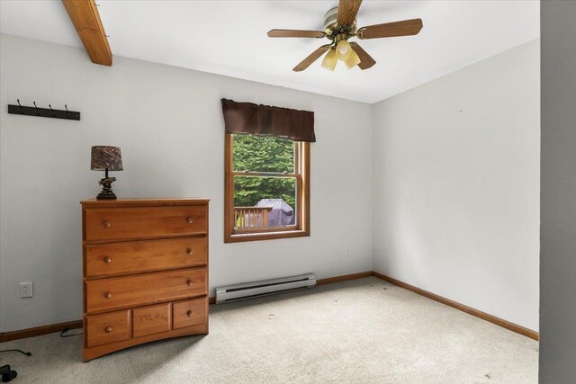 61 Travis Blvd, Catskill, NY 12414 - bedroom featuring baseboard heating, light colored carpet, and a ceiling fan