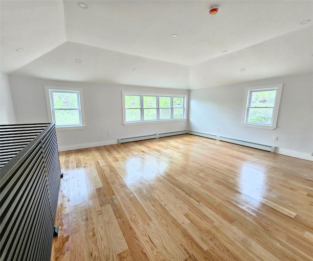 153-23 123rd Ave, Jamaica, NY 11434 - spare room with light wood-type flooring and vaulted ceiling