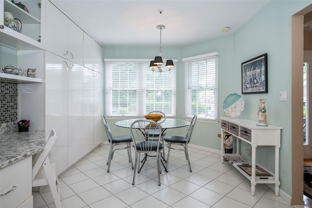 17 Jared Dr, White Plains, NY 10605 - dining room with a chandelier and baseboards