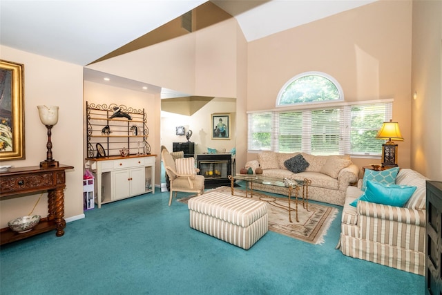 17 Jared Dr, White Plains, NY 10605 - carpeted living area featuring high vaulted ceiling and a glass covered fireplace