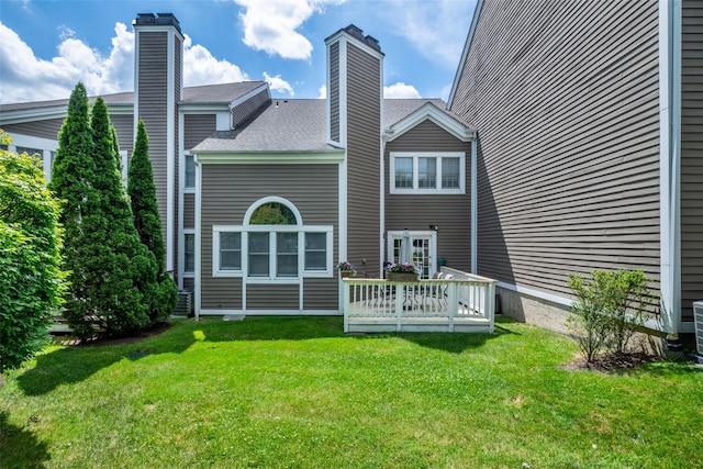 17 Jared Dr, White Plains, NY 10605 - rear view of house featuring a chimney, a yard, a deck, and a shingled roof