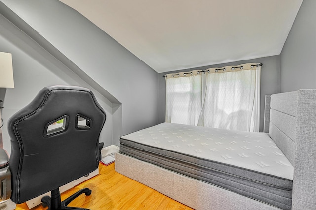 36 W Saint Marks Pl, Valley Stream, NY 11580 - bedroom featuring lofted ceiling and wood finished floors