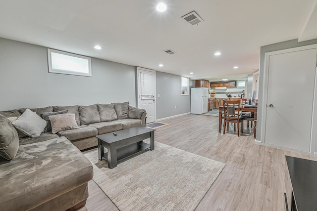 36 W Saint Marks Pl, Valley Stream, NY 11580 - living area featuring light wood-type flooring and recessed lighting