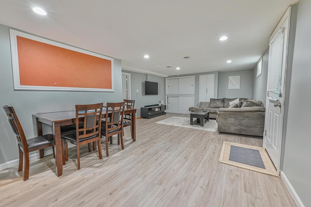 36 W Saint Marks Pl, Valley Stream, NY 11580 - dining area featuring wood finished floors and recessed lighting