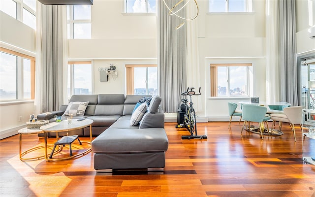 4318 Main St Unit 12A, Flushing, NY 11355 - living room with a towering ceiling and wood finished floors