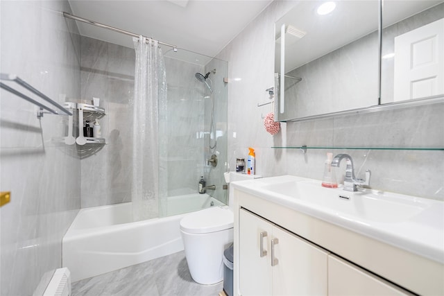 4318 Main St Unit 12A, Flushing, NY 11355 - bathroom with shower / bath combo, tile walls, vanity, and decorative backsplash