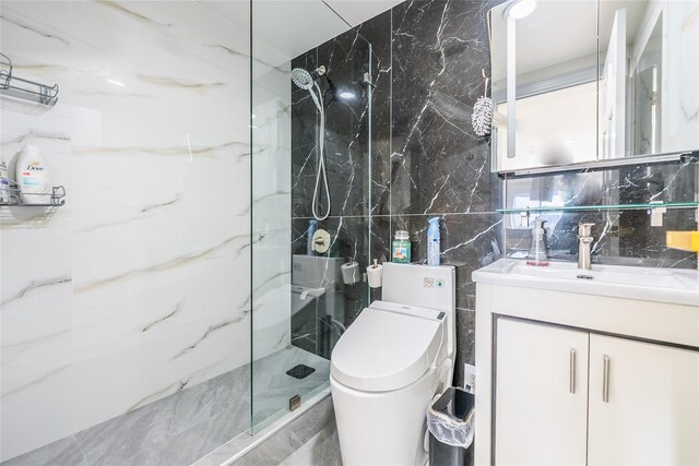4318 Main St Unit 12A, Flushing, NY 11355 - bathroom with tile walls, a marble finish shower, and vanity