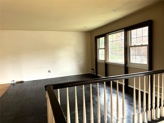 22 Kennedy Dr, Centereach, NY 11720 - unfurnished room with wood finished floors and recessed lighting