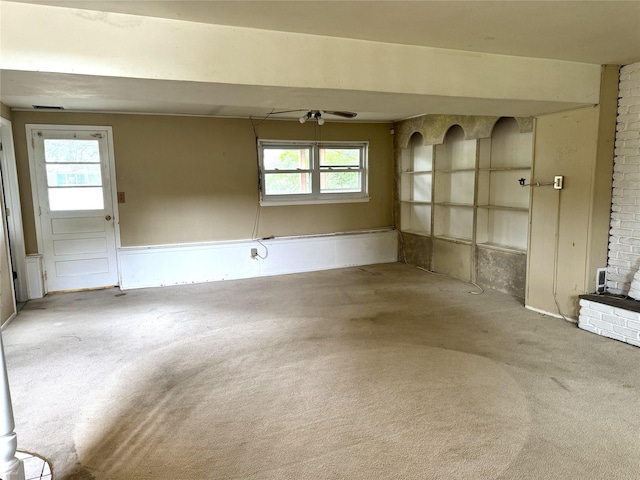 22 Kennedy Dr, Centereach, NY 11720 - unfurnished living room featuring carpet and healthy amount of natural light