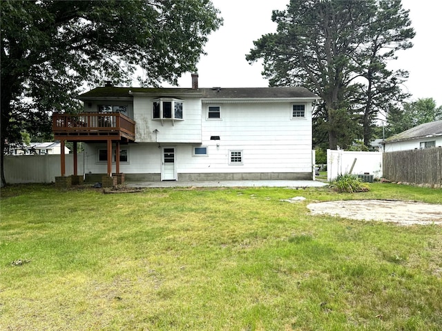 22 Kennedy Dr, Centereach, NY 11720 - back of house with a deck
