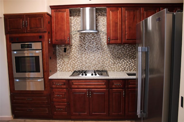 30-12 84th St, East Elmhurst, NY 11370 - kitchen with appliances with stainless steel finishes, a warming drawer, wall chimney range hood, and decorative backsplash