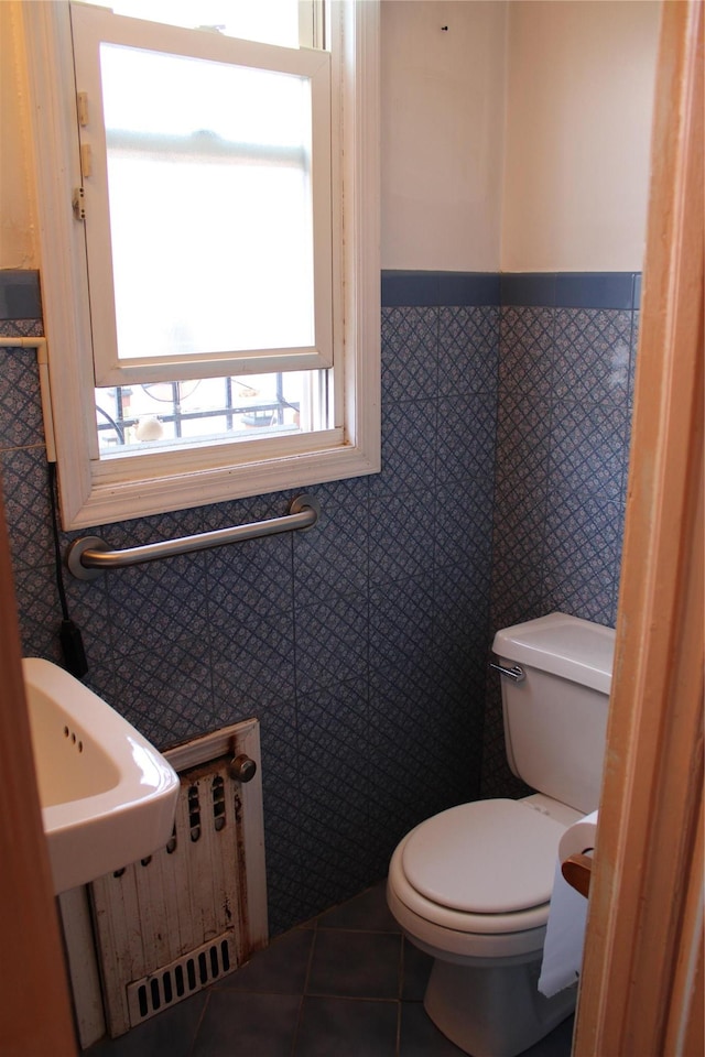 30-12 84th St, East Elmhurst, NY 11370 - bathroom with wainscoting and tile patterned flooring