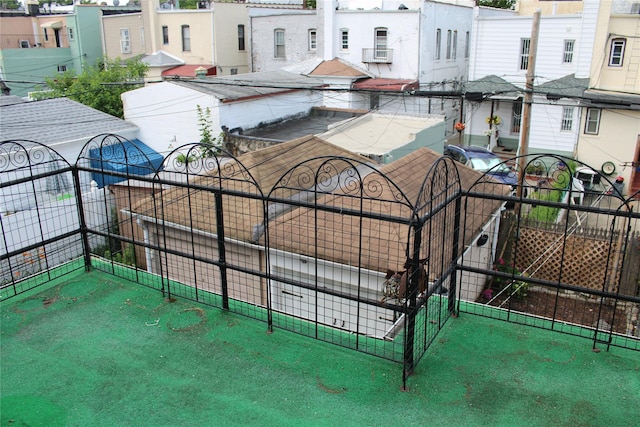 30-12 84th St, East Elmhurst, NY 11370 - view of community featuring a fenced front yard and a residential view