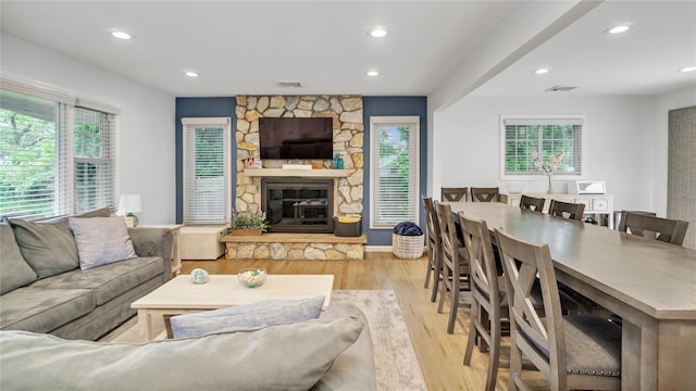 3 Yale, Hampton Bays, NY 11946 - living area featuring wood finished floors, a fireplace, and recessed lighting