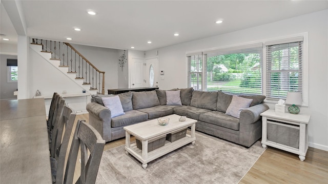 3 Yale, Hampton Bays, NY 11946 - living area featuring recessed lighting, light wood finished floors, and stairway