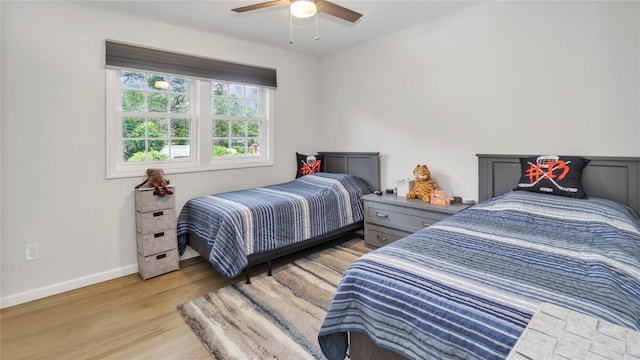 3 Yale, Hampton Bays, NY 11946 - bedroom with light wood finished floors and ceiling fan