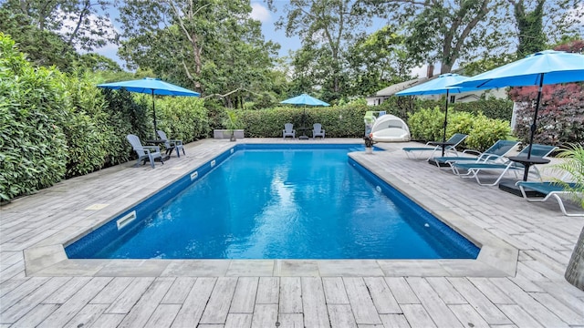 3 Yale, Hampton Bays, NY 11946 - view of swimming pool with a wooden deck
