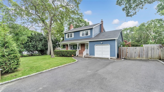 3 Yale, Hampton Bays, NY 11946 - view of front of property with a chimney, an attached garage, covered porch, asphalt driveway, and roof with shingles