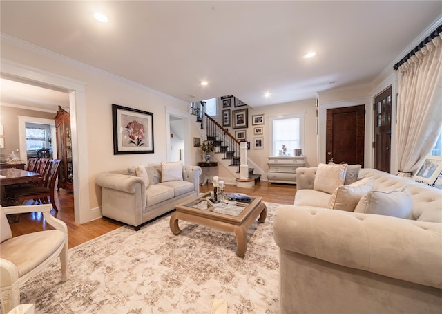 58 Hillside Ave, New Rochelle, NY 10801 - living room with stairway, light wood-type flooring, ornamental molding, healthy amount of natural light, and recessed lighting