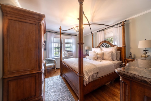 58 Hillside Ave, New Rochelle, NY 10801 - bedroom featuring ornamental molding, dark wood-style floors, and a chandelier