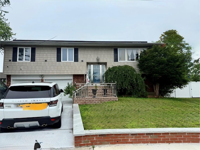 14 Hilton Ct, Hicksville, NY 11801 - bi-level home featuring a garage and brick siding