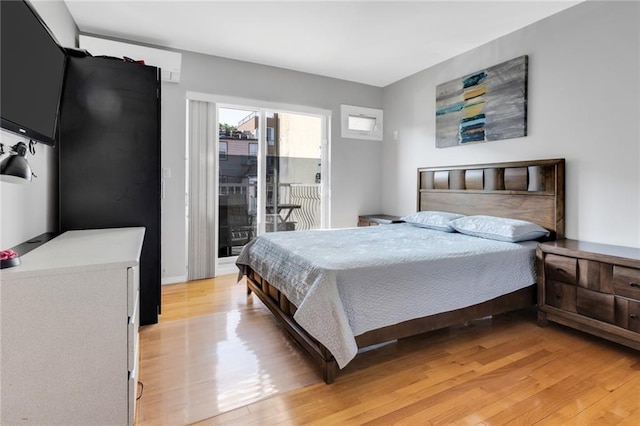 135 28th Ave Unit 2A, Brooklyn, NY 11214 - bedroom featuring light wood-type flooring and access to exterior