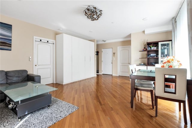 135 28th Ave Unit 2A, Brooklyn, NY 11214 - living room with light wood-style flooring