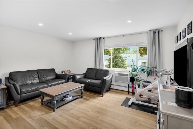 42 Richmond Blvd Unit 4B, Ronkonkoma, NY 11779 - living room featuring light wood finished floors, baseboard heating, and recessed lighting