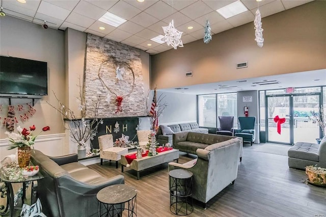 42 Richmond Blvd Unit 4B, Ronkonkoma, NY 11779 - community lobby with a drop ceiling, a towering ceiling, and a surveillance system