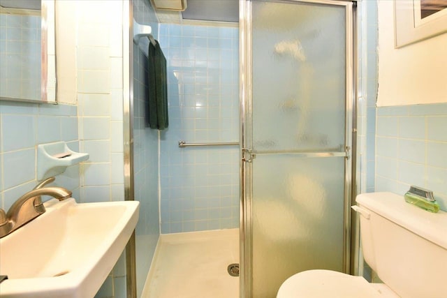 102-35 187th St, Hollis, NY 11423 - bathroom with tile walls and a shower stall
