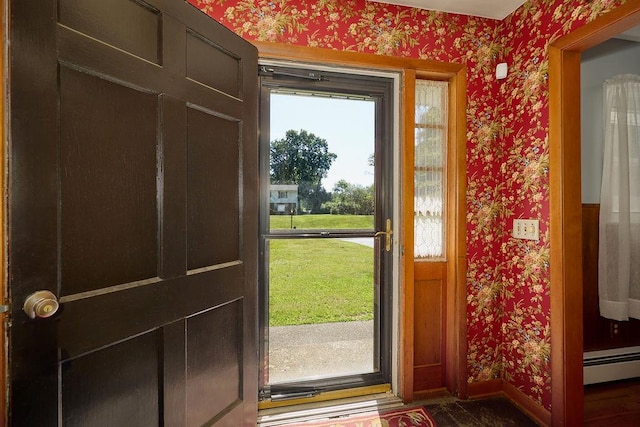 152 Bart Dr, Poughkeepsie, NY 12603 - doorway to outside featuring wallpapered walls and a baseboard radiator